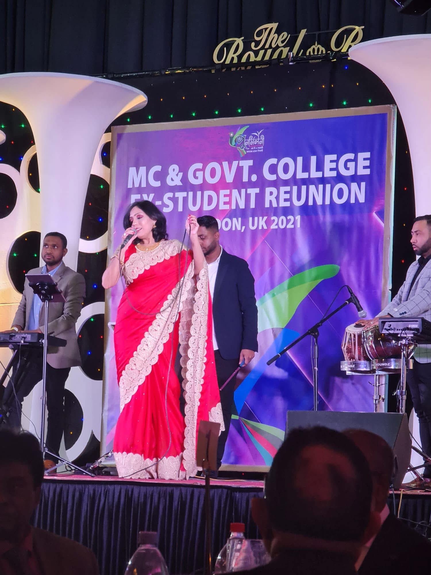 Rowshanara Moni singing in a red sari at the MC and Government College ex-student reunion in London